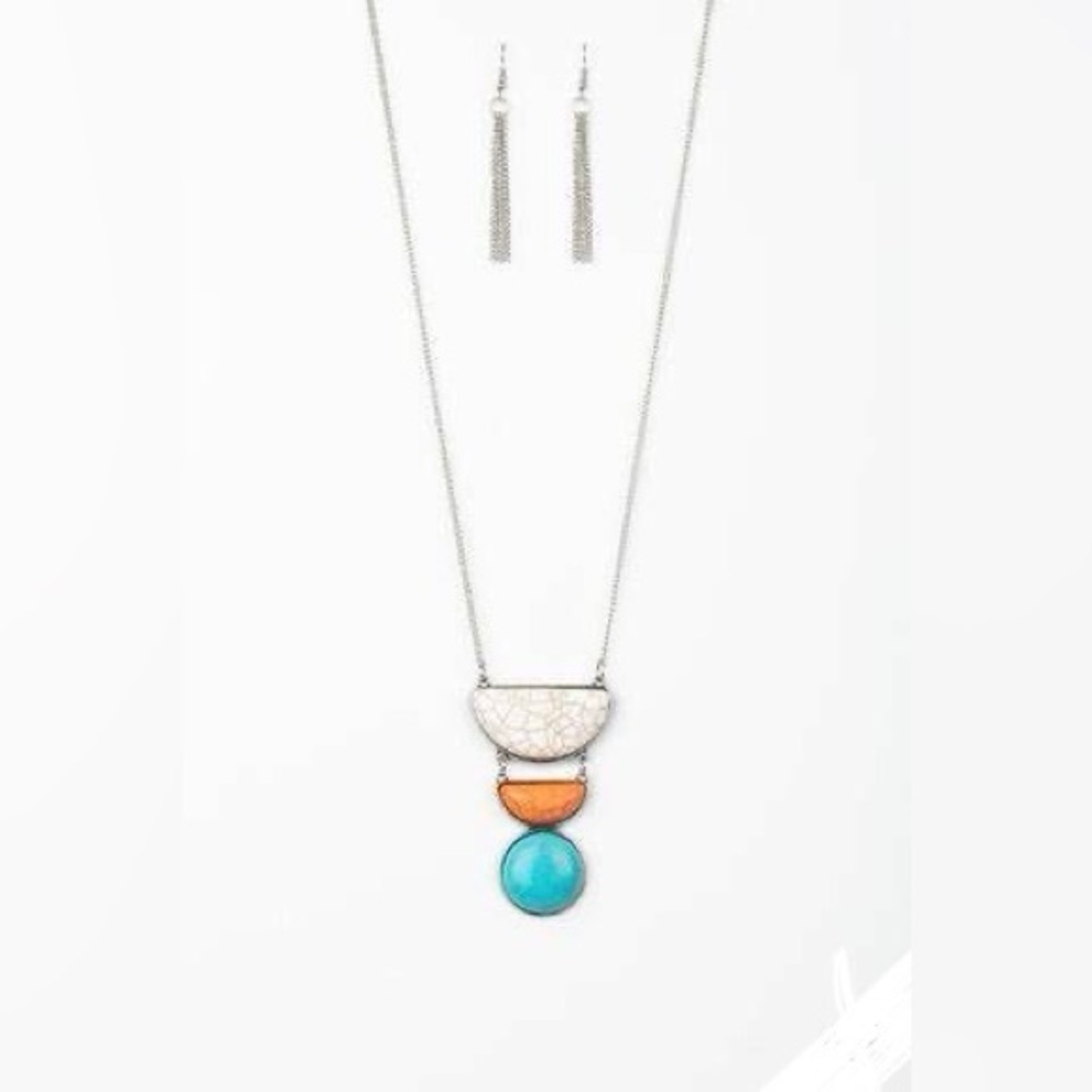 Long multi color pendant necklace.